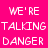 Four quadrants display the text "WE'RE TALKING DANGER" in pixelated white font against distinct solid backgrounds: bright pink, dark purple, black, and light gray.