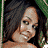 A 2x2 contact sheet of four pixelated frames showing a woman with long brown hair in various poses, alongside a black panel with white text reading "Coolbuddy.com".