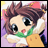 A pixelated anime-style character with brown hair and large black eyes wearing a green scarf, yellow top, and white sleeves on the left; adjacent to it is a black background with silver text reading "Anime IM" above smaller stylized text "cOm".