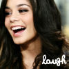 A close-up of a person with long dark brown hair smiling broadly, showing teeth, with the word 'laugh' in white cursive text at the bottom right.