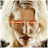 A 48x48 pixel animated contact sheet showing two frames of a Battlestar Galactica-themed buddy icon with a character and spaceship imagery.