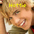 A pixelated image of a smiling person with blonde hair wearing a white and brown top, overlaid with yellow text.