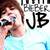 Pixelated image of a person with brown hair wearing a light blue shirt, with text 'LITTLE PERK' and 'JB' in bold black letters on a white background.