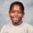 A pixelated portrait of a smiling person in a white shirt against a light gray background, with text overlays reading "R.I.P Michael" and "Never Forgotten <3" on black