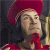A 512x256 contact sheet showing two animated frames of a pixelated character in red attire with green text reading "Original Icons .com" on the right side.