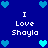 Blue background with pixelated hearts and repeated text "I Love Shayla" in white.