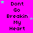 A bright pink background displays repeated text "Don't Go Breakin' My Heart" with scattered green and purple stars, partially obscured by a gray rectangle.