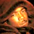 A pixelated static image of a bright orange-yellow glowing object with dark brown and black background elements, appearing as an abstract or stylized icon.