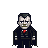 Pixel art of a figure in dark formal attire with red tie, standing against gray background.
