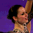 A 2x2 contact sheet of a pixelated animated icon featuring Sasha Cohen at the Torino 2006 Winter Olympics, with visible text and color blocks.
