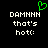 Pixelated text reads 'DAMNNN that's hot:' with a green heart symbol above the text on a black background.