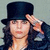 Two side-by-side frames from an animated AIM buddy icon showing a person in a top hat and a red pentagram symbol.