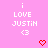 Pixelated pink background with repeated white text 'i LOVE JUSTIN <3' and red heart symbols in a