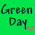 A static contact sheet of four identical frames showing pixelated text "Green Green Day" on a bright green background with pink heart symbols.