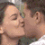 A 2x2 contact sheet of four animated frames showing couples kissing in various poses and settings, with visible pixelation and color blending typical of early digital animation.