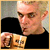 A pixelated contact sheet showing a person holding two mugs with text reading "he can bite me anytime" on the right side.