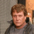 A 48x48 pixel buddy icon split into two frames showing a person with brown hair in gray clothing on the left and green text "OriginalIcons.com" on a dark green background on the right, part of an animated contact sheet.