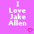 A static image with a bright pink background displays repeated text "I Love Jake Allen" in white pixelated font, each followed by a small pink heart symbol.