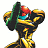 Pixelated static icon of a stylized character with green, red, blue, and yellow color scheme against white background.