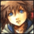 Pixelated static image of a character with brown hair and blue eyes, featuring bright highlights on the face and clothing against a dark background.