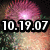Pixelated image showing time display over blurred background with pink and green hues.
