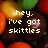 Pixelated text overlays on a background of colorful candy-like shapes in yellow, green, red, and brown.