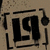 Two side-by-side frames of a pixelated animated buddy icon featuring the number 19 with distinct visual treatments in each frame.