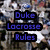 Pixelated static image with blue text on black rectangular backgrounds layered over a blurred multicolored pixel grid.