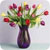 A pixelated bouquet of red and purple flowers in a dark blue vase against a light gray background.