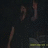 Pixelated image of a person in dark clothing with a yellow stripe, overlaid with bright pink text blocks reading "i took this picture of william beckett at tai concert" and "oh yea !!!".