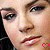 A 50x50 pixel animated contact sheet showing two frames of a close-up face with pink heart icons, likely from an AOL Instant Messenger buddy icon animation.