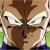 A pixelated static image shows a character with brown hair styled in spikes, intense eyes, and clenched fists near the face against a blurred background.