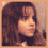 Four pixelated profile views of a person with brown hair and bangs, arranged in a against a light background