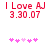 Red text reads "I Love AJ" above "3.30.07" with pink heart symbols below, displayed in two side-by-side pixelated frames showing animation changes.