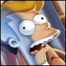 Close-up of a cartoon character with light blue skin, large white eyes with black pupils, and a wide open mouth showing teeth and tongue, wearing a brown jacket over a white shirt.
