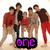 Group of six people in casual clothing with text changing from 'one' to 'direction' below them.
