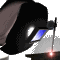 Animated sequence showing a dark helmeted figure with glowing eyes and a red light source below, transitioning through