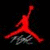Red silhouette of a basketball player jumping with arms raised on black background, below which is 'NIKE' script text.