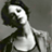 Static 48x48 pixel buddy icon depicting a stylized figure with dark hair and light skin against a gray background, rendered in low-resolution grayscale with visible dithering and blocky artifacts.