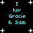 Pixelated cyan text on black background with white stars, displaying "I luv Gracie & Sam" in two vertical