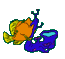 Pixelated orange fish with yellow fins and blue body parts against gray background, two states showing different tail shapes.