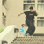 A 2x2 contact sheet of three animated frames showing a person performing skateboarding tricks on stairs and railings in front of a building with windows and greenery.