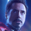 Pixelated static image of a man's face with blue and purple lighting against a dark background, featuring visible dithering and anti-aliasing artifacts.