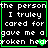 Four identical display pixelated text on black backgrounds with green borders, each containing a broken heart symbol
