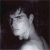 Pixelated grayscale image of a person's profile with hand near head, next to green background with bright green text reading 'Original Icons .com'.