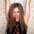 Static 50x50 pixel buddy icon showing a person with long brown hair wearing a black top, arms raised against a light background.