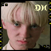 nine identical pixelated images showing a person with platinum blonde hair and blue eyes, each bordered by black frames with yellow dots