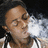 Pixelated close-up of a person with closed eyes exhaling white smoke against a dark background.