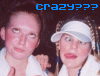 Two people in white clothing with a dark background, one wearing a white visor and the other not, under blue text reading 'crazy???'.