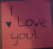 A static image of a pink note with handwritten text and heart symbols, showing variations in top text across three